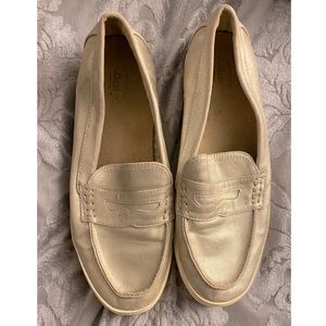 G.H. Bass Gold loafers.